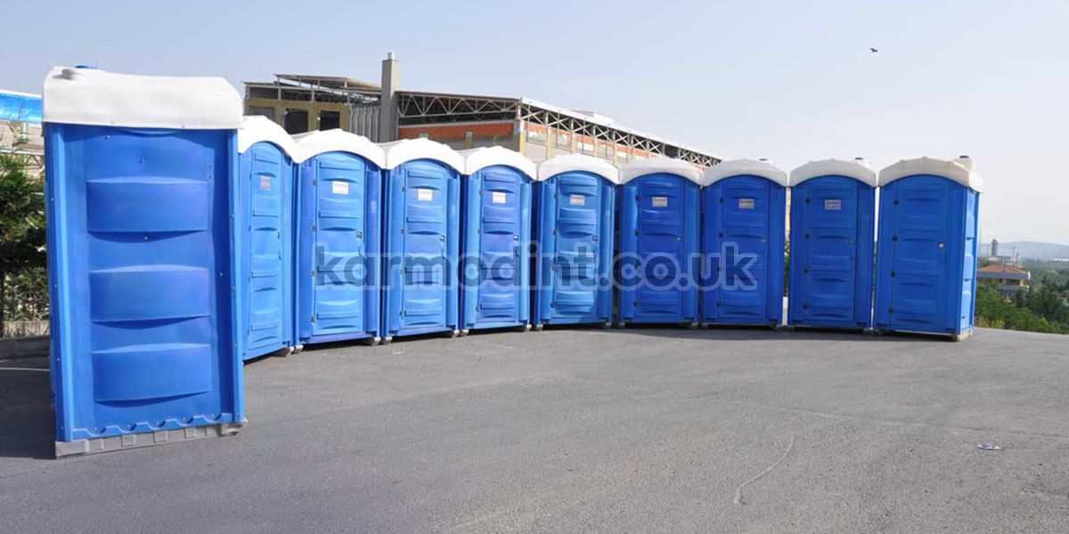Portable chemical toilet displayed centrally